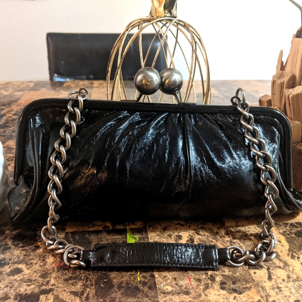 Metro 7 small black clutch purse